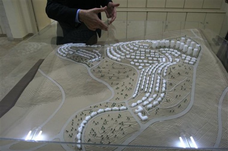 FILE - In this Jan. 6, 2010 file photo, a model of the first Palestinian planned city, Rawabi, is seen at the office of Bayti Real Estate Investment Company, the company behind the project, in the West Bank city of Ramallah. About 20 Israeli suppliers will help to build the first modern Palestinian city, but only after promising not to use products or services from Israeli settlements, the project's developer said Tuesday, Dec. 28, 2010.(AP Photo/Majdi Mohammed, Files)